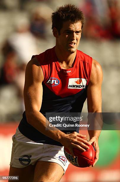 Jared Rivers of the Demons kicks during the round six AFL match between the North Melbourne Kangaroos and the Melbourne Demons at Etihad Stadium on...