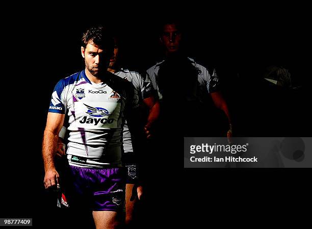 Cameron Smith of the Storm leads his team onto the field during the round eight NRL match between the North Queensland Cowboys and the Melbourne...