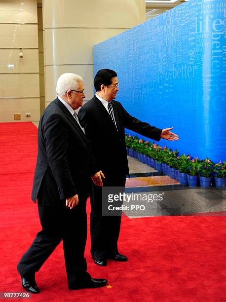 Chinese President Hu Jintao shakes hands with Palestinian President Mahmoud Abbas during a meeting on May 1, 2010 in Shanghai, China. Abbas attended...