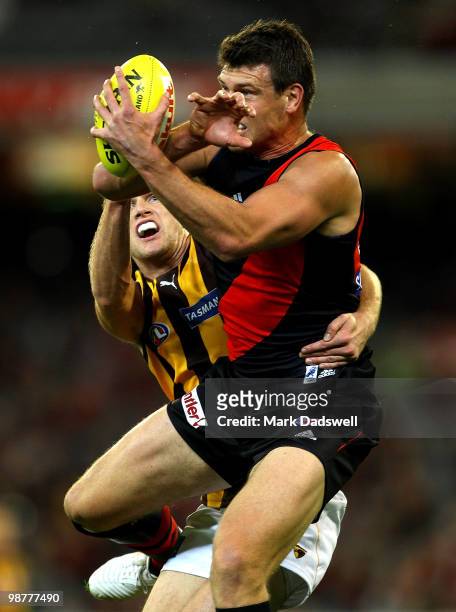 David Hille of the Bombers marks during the 6 AFL match between the Essendon Bombers and the Hawthorn Hawks at Melbourne Cricket Ground on May 1,...