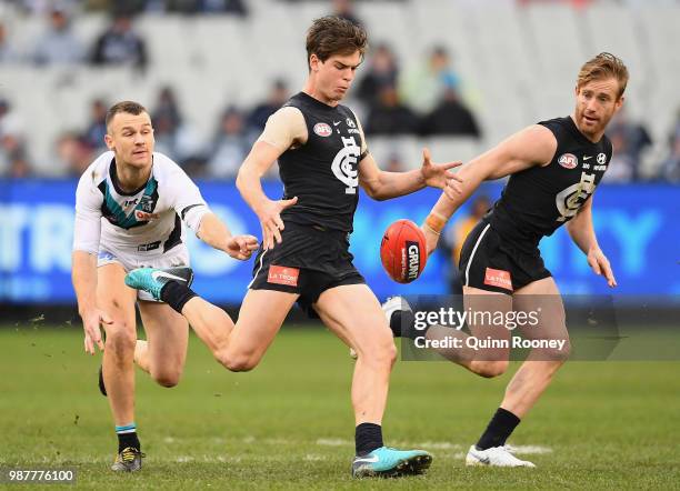 Paddy Dow of the Blues kicks during the round 15 AFL match between the Carlton Blues and the Port Adelaide Power at Melbourne Cricket Ground on June...