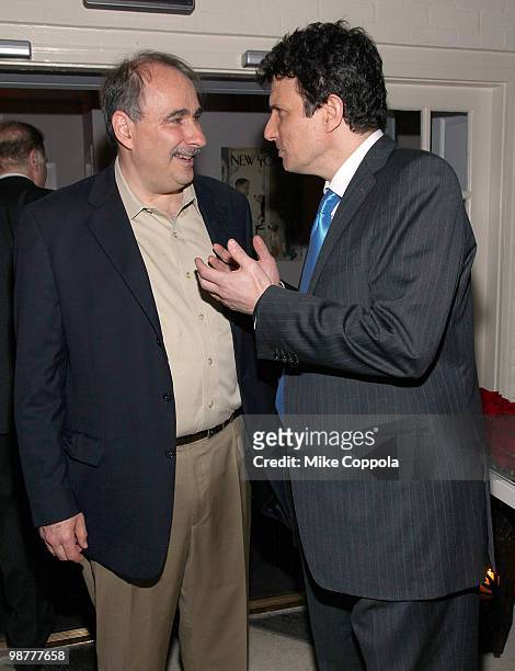 The New Yorker magazine editor David Remnick and top political advisor David Axelrod speak at the The New Yorker party during White House...