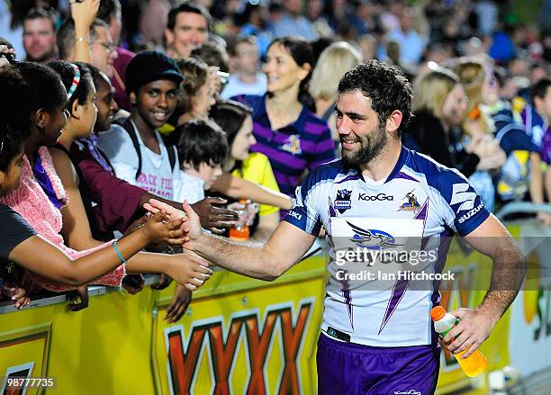 Cameron Smith of the Storm acknowledges fans after winning the round eight NRL match between the North Queensland Cowboys and the Melbourne Storm at...