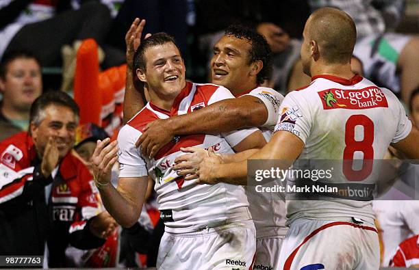 Brett Morris of the Dragons celebrates his third try during the round eight NRL match between the St George Dragons and the Cronulla Sharks at WIN...