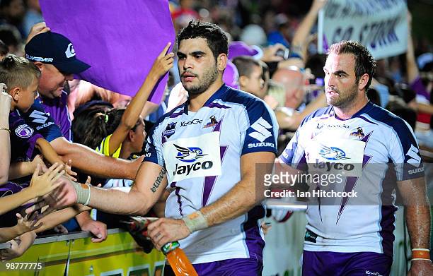 Greg Inglis andGreg Inglis of the Storm acknowledge fans after winning the round eight NRL match between the North Queensland Cowboys and the...