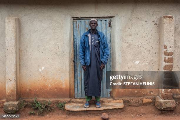 Rabiu Hussein from the Fulani village Luggere in the Barkin Ladi area in Plateau State poses for a photo on June 29, 2018. - Plateau State in Nigeria...