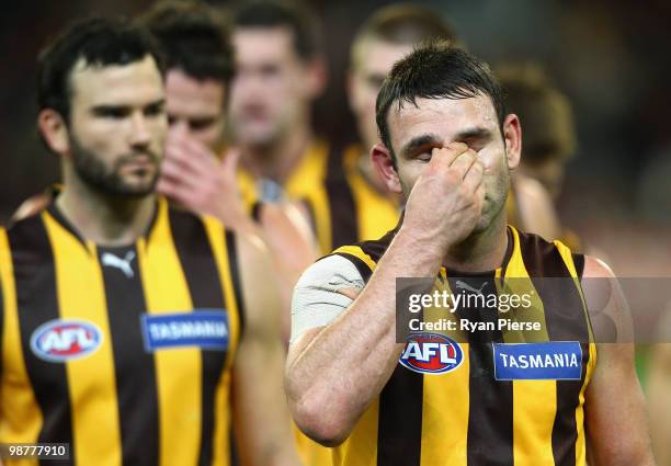 Brent Guerra of the Hawks looks dejected as he leaves the ground after the round six AFL match between the Essendon Bombers and the Hawthorn Hawks at...