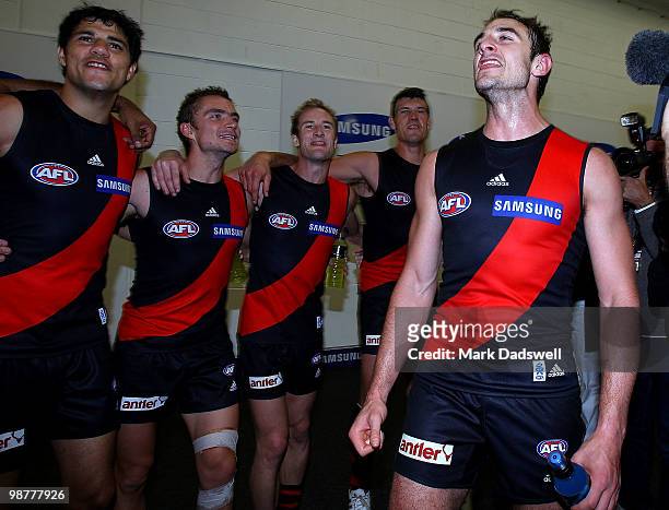 Jobe Watson Captain of the Bombers sings the team song after their win in the round 6 AFL match between the Essendon Bombers and the Hawthorn Hawks...