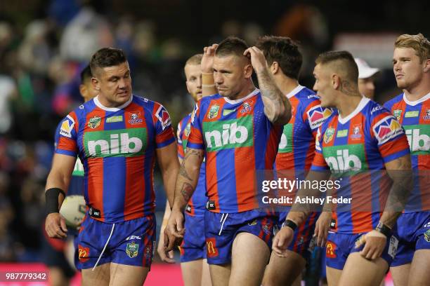 Shaun Kenny-Dowall of the Knights walks with his team during the round 16 NRL match between the Newcastle Knights and the Canterbury Bulldogs at...