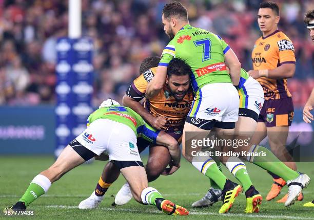 Sam Thaiday of the Broncos takes on the defence during the round 16 NRL match between the Brisbane Broncos and the Canberra Raiders at Suncorp...