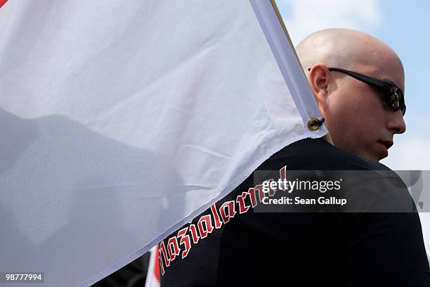 Neo-Nazi supporters, including one with a t-shirt that reads: "Nazi Alarm!" arrive at a rally and march on May 1, 2010 in Berlin, Germany. Several...