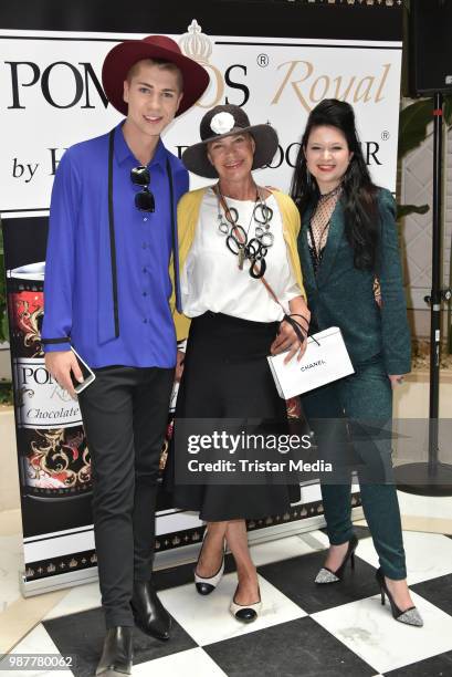 Maximilian Seitz, Barbara Herzsprung and guest during the POMPOEOES Royal presentation on June 28, 2018 in Berlin, Germany.