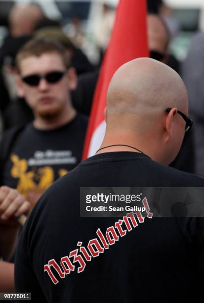 Neo-Nazi supporters, including one with a t-shirt that reads: "Nazi Alarm!" arrive at a rally and march on May 1, 2010 in Berlin, Germany. Several...