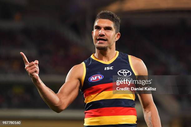 Curly Hampton of the Crows celebrates after kicking a goal during the round 15 AFL match between the Adelaide Crows and the West Coast Eagles at...