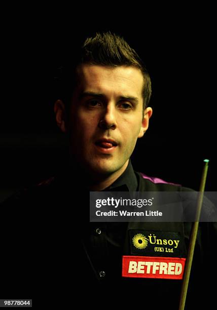 Mark Selby of England in action against Graeme Dott of Scotland during the semi final of the Betfred.com World Snooker Championships at The Crucible...