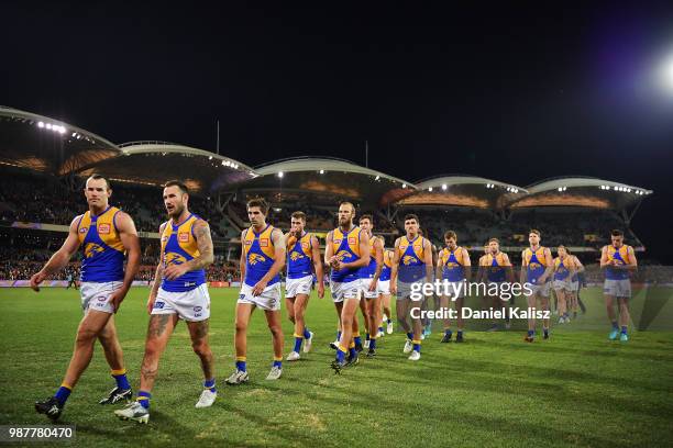 Shannon Hurn of the Eagles leads his team from the field after the round 15 AFL match between the Adelaide Crows and the West Coast Eagles at...