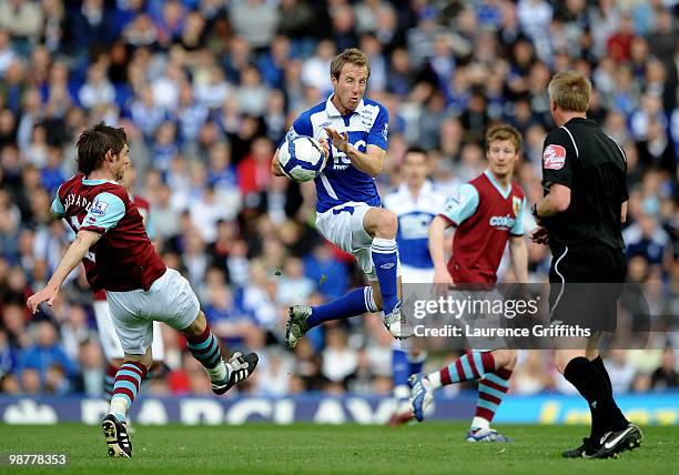 Lee Bowyer of BIrmingham City battles for the ball with Graham Alexander of Burnley during the Barclays Premier League match between Birmingham City...