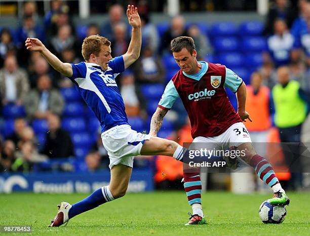 Birmingham City's Swedish midfielder Sebastian Larsson vies with Burnley's English defender Daniel Fox during the English Premier League football...