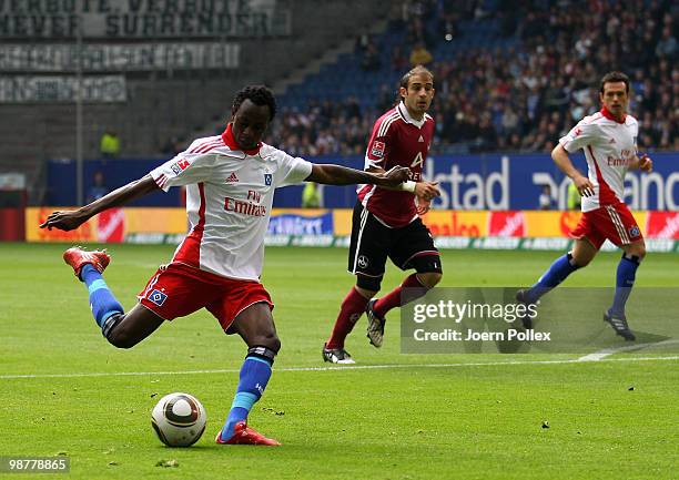 Jonathan Pitroipa of Hamburg scores his team's first goal during the Bundesliga match between Hamburger SV and 1. FC Nuernberg at HSH Nordbank Arena...