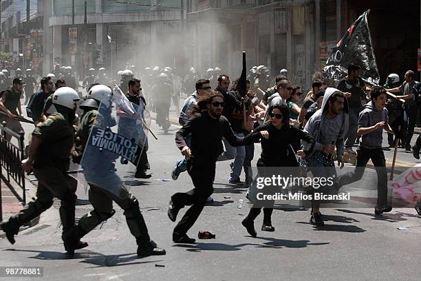 Greek riot police clash with protesters during May Day protests on May 1, 2010 in Athens, Greece. Thousands of protesters gathered in Athens and...