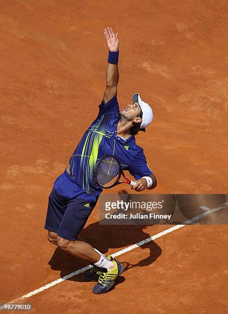 Fernando Verdasco of Spain serves to David Ferrer of Spain plays a backhand in his match against during day seven of the ATP Masters Series - Rome at...