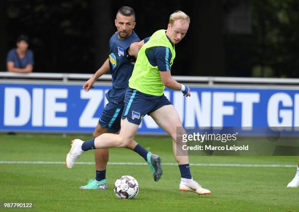 Vedad Ibisevic and Dennis Jastrzembski of Hertha BSC during the training at Schenkendorfplatz on June 30, 2018 in Berlin, Germany.