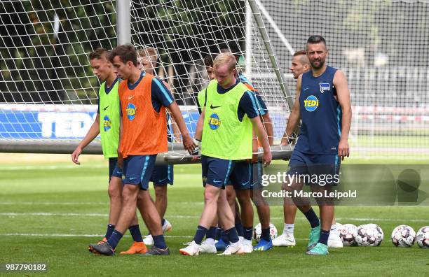 Palko Dardai, Maximilian Pronichev, Dennis Jastrzembski and Vedad Ibisevic of Hertha BSC during the training at Schenkendorfplatz on June 30, 2018 in...