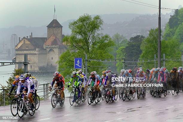 The pack passes the Chillon Castle during the fourth stage, a 157,9km stage from Vevey to Chatel, France at the UCI protour Tour de Romandie cycling...