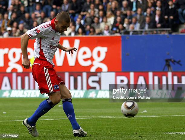 Mladen Petric of Hamburg scores his team's second goal during the Bundesliga match between Hamburger SV and 1. FC Nuernberg at HSH Nordbank Arena on...