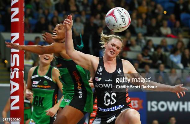 Caitlin Thwaites of the Magpies and Stacey Francis of the Fever compete for the ball during the round nine Super Netball match between the Magpies...