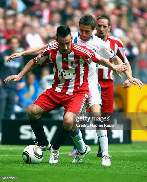 Diego Contento and Franck Ribery of Bayern battle for the ball with Stanislav Sestak of Bochum during the Bundesliga match between FC Bayern Muenchen...