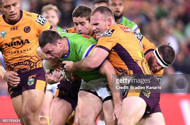 Shannon Boyd of the Raiders takes on the defence during the round 16 NRL match between the Brisbane Broncos and the Canberra Raiders at Suncorp...