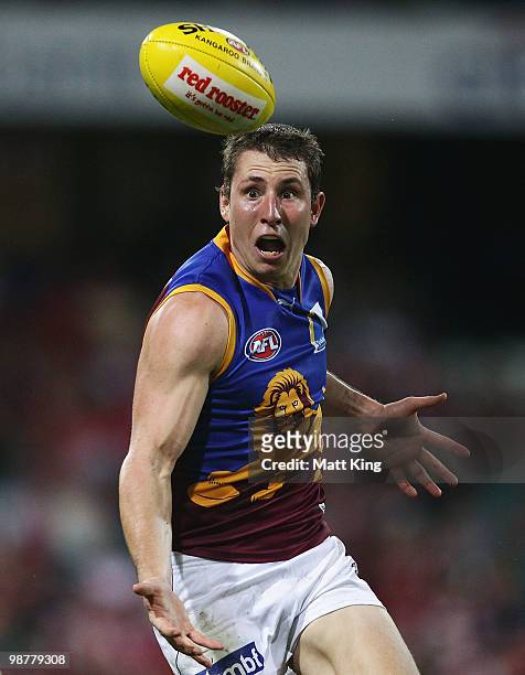 James Polkinghorne of the Lions juggles the ball during the round six AFL match between the Sydney Swans and the Brisbane Lions at the Sydney Cricket...