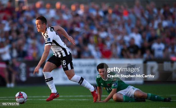 Louth , Ireland - 29 June 2018; Robbie Benson of Dundalk and Barry McNamee of Cork City during the SSE Airtricity League Premier Division match...