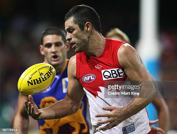 Heath Grundy of the Swans juggles the ball during the round six AFL match between the Sydney Swans and the Brisbane Lions at the Sydney Cricket...