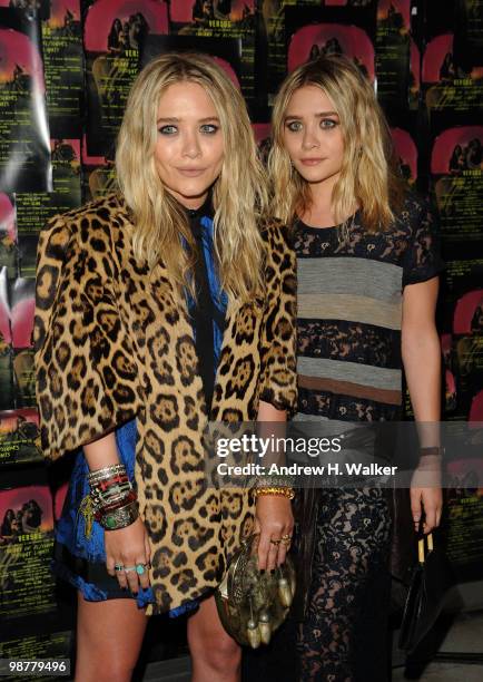 Actors Mary-Kate Olsen and Ashley Olsen attend Art of Elysium "Bright Lights" with VERSUS by Donatella Versace and Christopher Kane at Milk Studios...