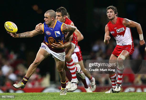 Ashley McGrath of the Lions juggles the ball during the round six AFL match between the Sydney Swans and the Brisbane Lions at the Sydney Cricket...