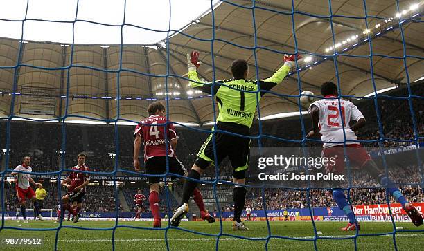 Mladen Petric of Hamburg scores his team's second goal during the Bundesliga match between Hamburger SV and 1. FC Nuernberg at HSH Nordbank Arena on...