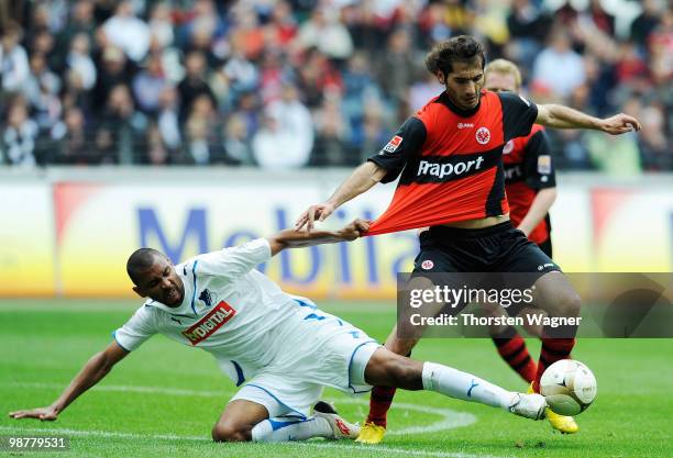 Halil Altintop of Frankfurt battles for the ball with Marvin Compper of Hoffenheim during the Bundesliga match between Eintracht Frankfurt and TSG...