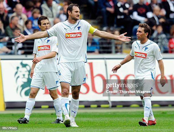 Christian Eichner, Josip Simunic and Tobias Weis of Hoffenheim looks dejected during the Bundesliga match between Eintracht Frankfurt and TSG 1899...