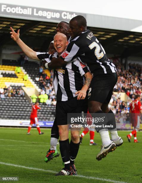 Lee Hughes of Notts County is congratulated on his goal during the Coca-Cola League Two match between Notts County and Cheltenham Town at Meadow Lane...