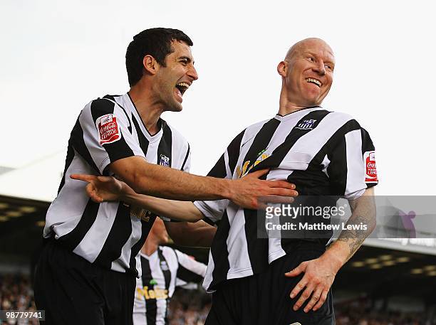 Lee Hughes of Notts County is congratulated by Mike Edwards, after scoring his second goal during the Coca-Cola League Two match between Notts County...