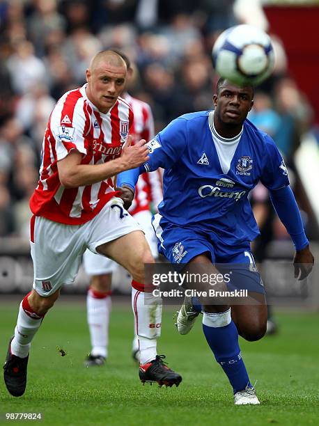 Victor Anichebe of Everton in action with Andy Wilkinson of Stoke City during the Barclays Premier League match between Stoke City and Everton at...