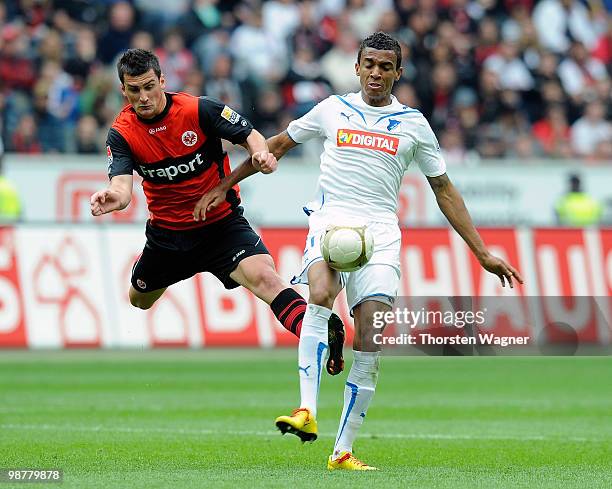 Martin Fenin of Frankfurt battles for the ball with Luiz Gustavo of Hoffenheim during the Bundesliga match between Eintracht Frankfurt and TSG 1899...