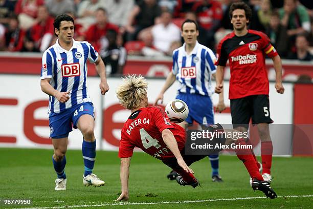 Gojko Kacar of Berlin watches Sami Hyypiae of Leverkusen struggle with the ball during the Bundesliga match between Bayer Leverkusen and Hertha BSC...