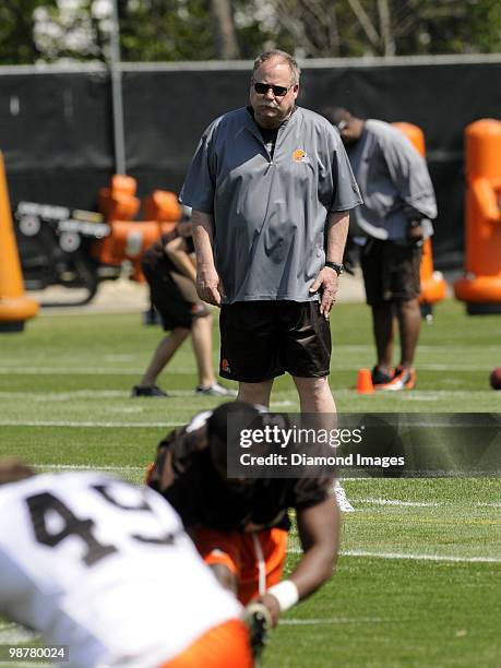 President Mike Holmgren of the Cleveland Browns watches players go through drills during the team's rookie and free agent mini camp on April 30, 2010...