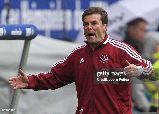 Head coach Dieter Hecking of Nuernberg gestures during the Bundesliga match between Hamburger SV and 1. FC Nuernberg at HSH Nordbank Arena on May 1,...