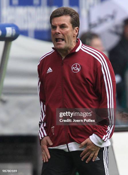 Head coach Dieter Hecking of Nuernberg gestures during the Bundesliga match between Hamburger SV and 1. FC Nuernberg at HSH Nordbank Arena on May 1,...