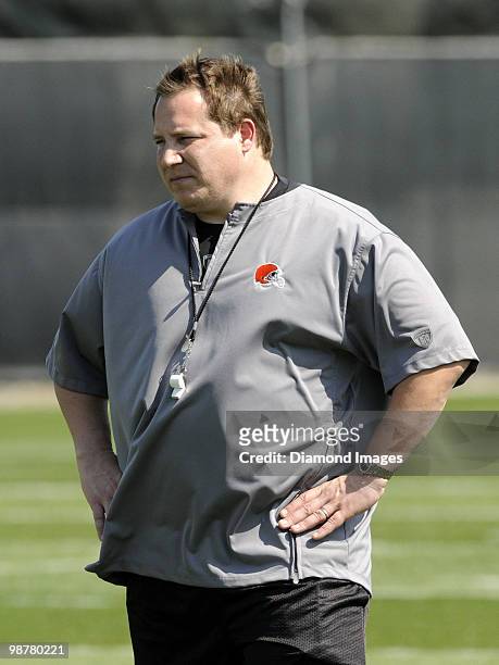 Head coach Eric Mangini of the Cleveland Browns watches players go through drills during the team's rookie and free agent mini camp on April 30, 2010...