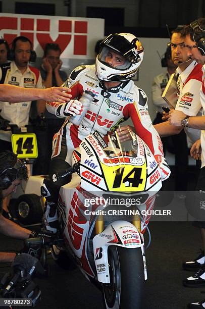Honda's French Randy de Puniet gestures in the pits during the Moto GP qualifying session at Jerez de la Frontera's circuit on May 1, 2010. Dani...
